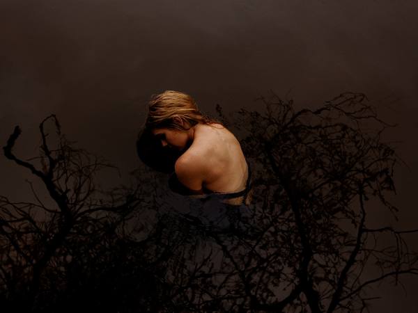 Photograph Tyler Shields  Girl In The Pond on One Eyeland